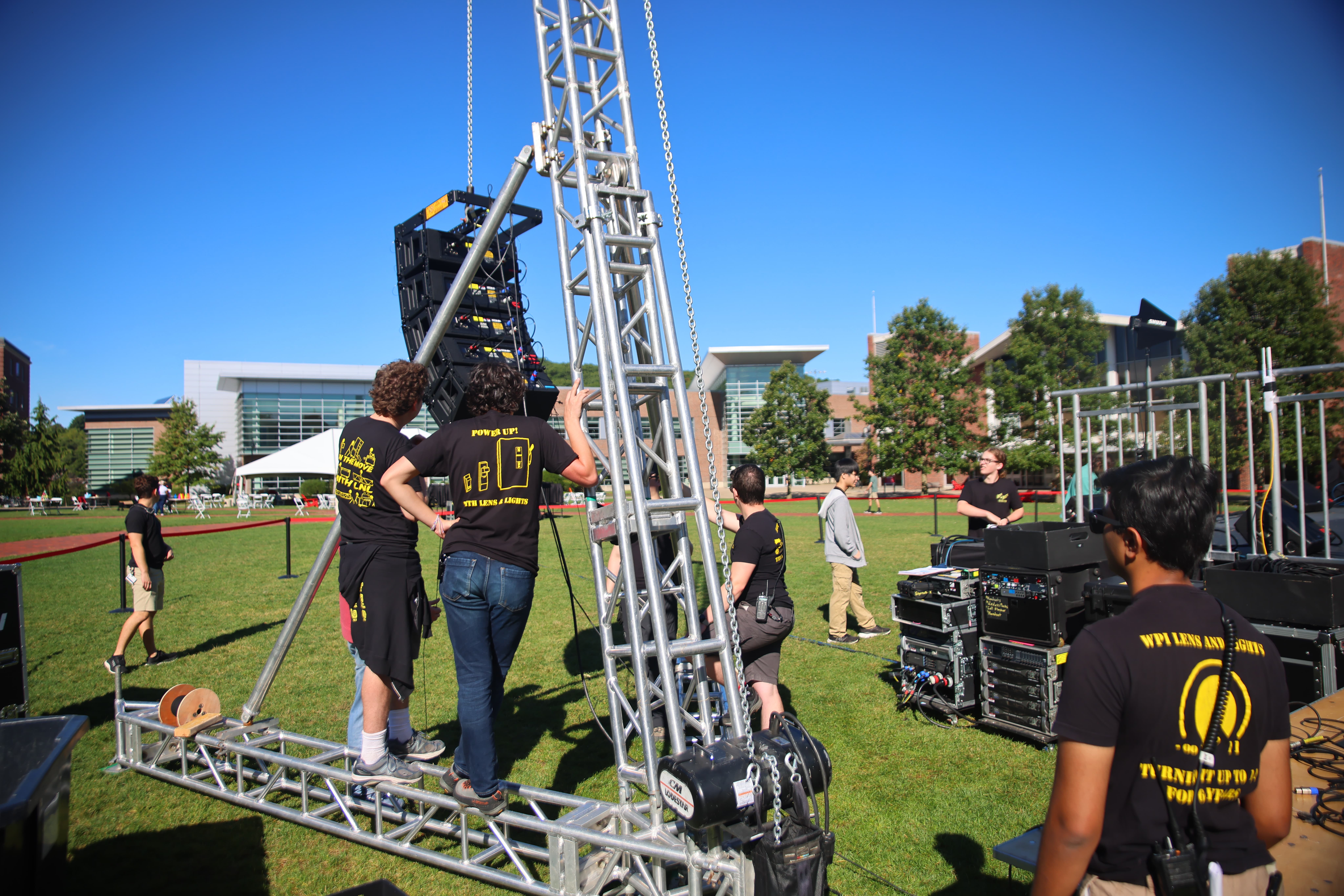 EAW line arrays hung on rented LA12-25towers on the Quad for Pep Rally